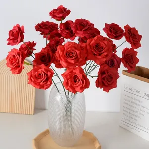 Lifelike artificial red roses in a textured glass vase for wedding and home decor