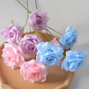 Beautiful silk artificial roses in pink blue and purple for elegant wedding decoration