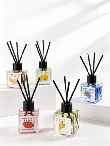 Buntes Frucht-Duftstäbchen-Set mit schwarzen Stäbchen für die Raumduftdekoration.
