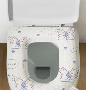 Detail view of waterproof toilet seat cover with cute bunny pattern, thickened design for home.