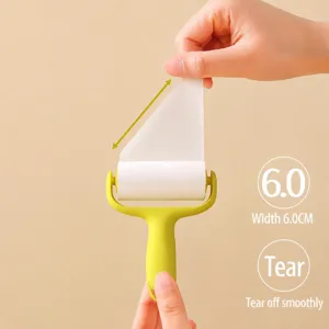 Mini lint roller with diagonal tear design, portable sticky hair remover brush for pet fur.