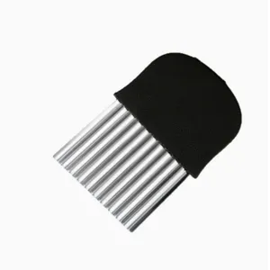 Stainless steel crinkle cutter kitchen tool for wavy potato chips and vegetable slicing.