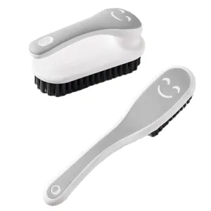 Multi-functional cleaning brush set with soft bristles for shoes and clothes, grey and white design.