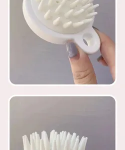 Silicone scalp massager brush with ergonomic handle for gentle hair washing and deep cleaning.
