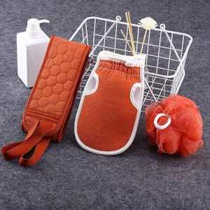 Oranje badpeeling set inclusief rugborstel, handschoen en spons voor lichaamsverzorging