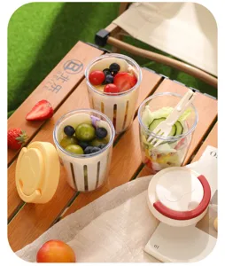 Portable clear fruit salad cup with strainer fork and lid for outdoor picnic food container