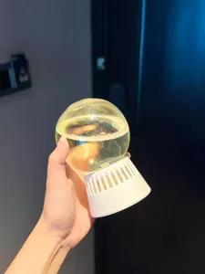 Inverted aroma diffuser ball detail, essential oil liquid for indoor fragrance and room odor.