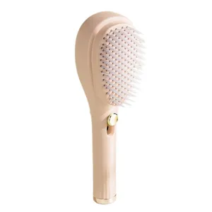 Spazzola per capelli con cuscino retrattile, pettine massaggiante rosa vista principale.