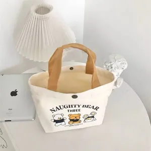 Detailed view of the cute bear canvas tote bag, showcasing clean stitching and printed design.