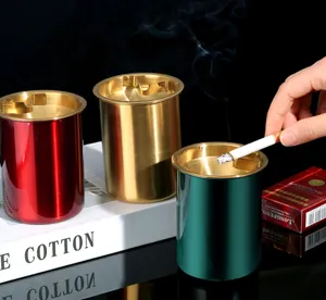 Stainless steel windproof ashtray with creative funnel design for office or home decor.