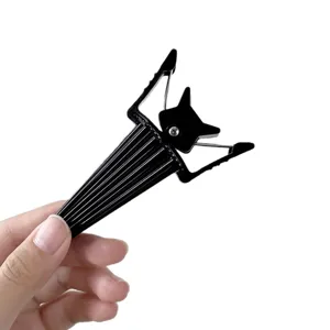 Black hair root volumizing clip for daily styling, portable duckbill clip for lifting hair.