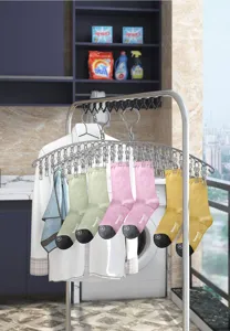 Stainless steel laundry drying rack with multi-clips holding socks in a laundry room