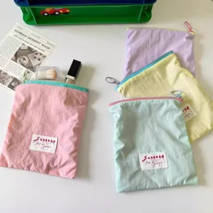 Portable macaron colorblock cosmetic bag minimalist zipper pouch for daily makeup storage detail