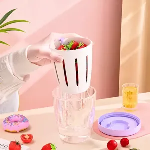 Portable double layer draining fruit cup salad cup with fork for fresh food storage and travel.