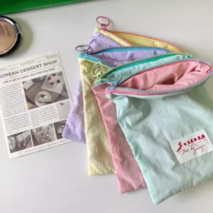 Macaron color contrast zipper cosmetic pouch, portable makeup storage bag for travel daily use.