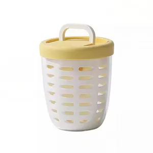 Portable drainable fruit salad cup with handle and lid for fresh food storage daily.