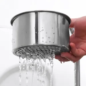 Panier d'evier de cuisine en acier inoxydable avec trous fins pour un drainage et un filtrage faciles.