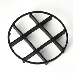Black plastic flower pot bottom grid drainage stand detail view for root protection.