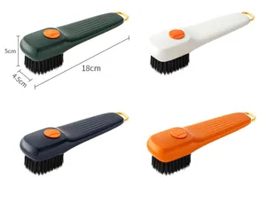 Multifunctional liquid dispensing shoe brush with soft bristles and hanging ring for home cleaning.