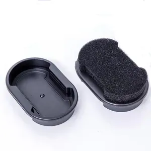 Black shoe shine sponge kit with protective case for easy leather shoe cleaning and care.