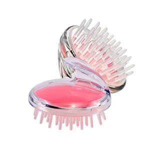 Silicone scalp massage shampoo brush with ergonomic handle for comfortable hair washing and care.