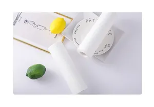 Reusable lazy kitchen paper rolls, white embossed disposable dish cloths for daily cleaning.