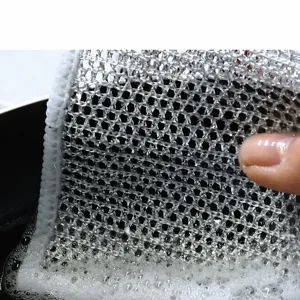 Close-up detail of silver wire dishcloth mesh texture for efficient kitchen cleaning.