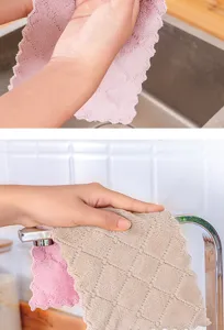 Close-up of thickened absorbent coral fleece kitchen dish cloths in use