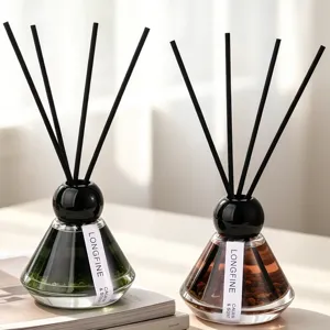 Aromatherapy reed diffuser set with glass bottle and black sticks for home room fragrance decor