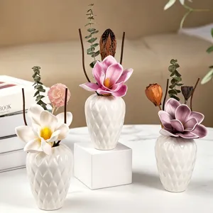 Set de floreros difusores de cerámica retro con flores secas para decoración del hogar.