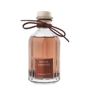 Glasflasche rauchloser Raumduft Diffusor mit brauner Schleife und Oud Duft für zu Hause.