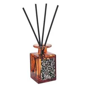 Crystal glass reed diffuser bottle with sparkling rhinestones for home and bedroom decor.