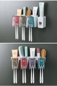 Set de soporte de cepillo de dientes de pared con dispensador automático de pasta.
