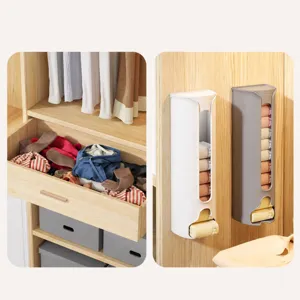 Wall-mounted underwear and socks storage box organizer for home wardrobe organization.