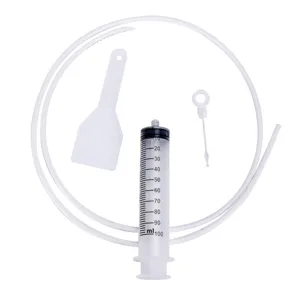 Refrigerator drain hole cleaner kit with 100ml syringe and long tube for home kitchen use.