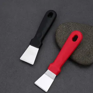 Grattoir de nettoyage de cuisine multifonctionnel pour la graisse et la saleté des joints.