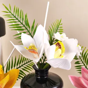 Artificial orchid flower reed diffuser set with black vase for home decor and aromatherapy