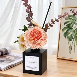 Künstlicher Nelken Blumenstrauß Aroma Diffusor, schwarze quadratische Flasche für Heimdekoration.