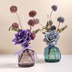Artificial rose and ball chrysanthemum reed diffuser set, elegant home decor fragrance bottle.
