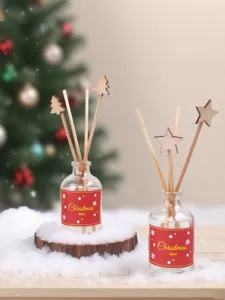 Diffuseur de parfum de Noël avec batonnets en bois et etoile, flacon verre 50ml.