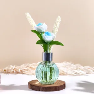 Glasflasche Aromatherapie Diffusor mit künstlichen Rosen und Gräsern für Heimdekoration