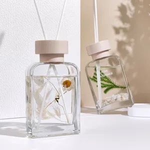 Difusor de aroma para el hogar en botella de vidrio con flores secas y varillas 100ml