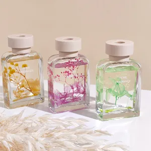 Difusor de aromas para el hogar con flores preservadas en botellas de vidrio para decoración