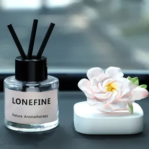 Car air freshener diffuser set with jasmine plaster flower and reed diffuser bottle for auto.
