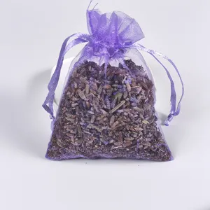 Lavender dried flower sachet close-up view in purple mesh bag with natural fragrance.