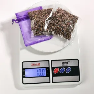 Lavender dried flower sachets with purple mesh bags detail view showing product weight.