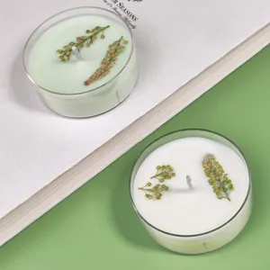 Scented soy wax tea candles with dried floral decoration in clear cups for home decor gift