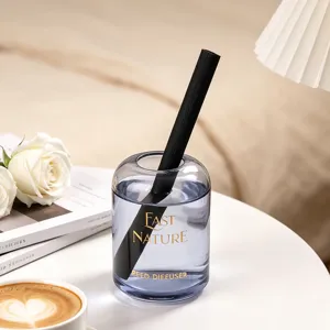 Minimalist reed diffuser with black stick, elegant home fragrance decor for hotel and living room.