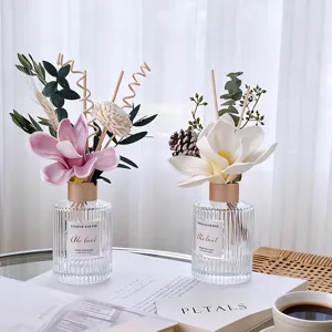 Garden series reed diffuser home fragrance set with dried flowers and glass bottle decor.
