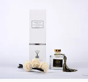 Reed diffuser set with glass bottle, aroma sticks, sola flowers and elegant packaging box.